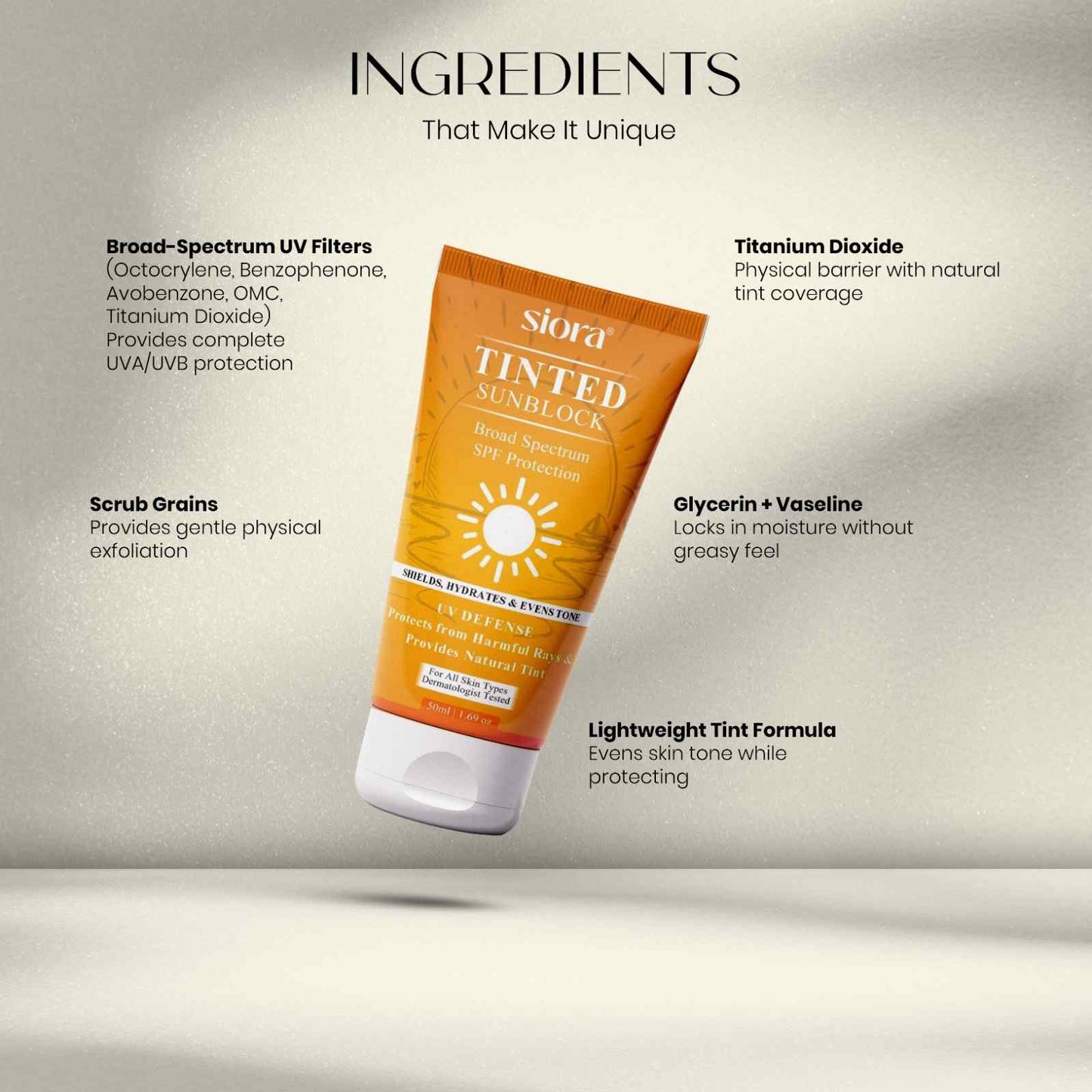 Tinted sunblock tube with ingredients listed on a gray background